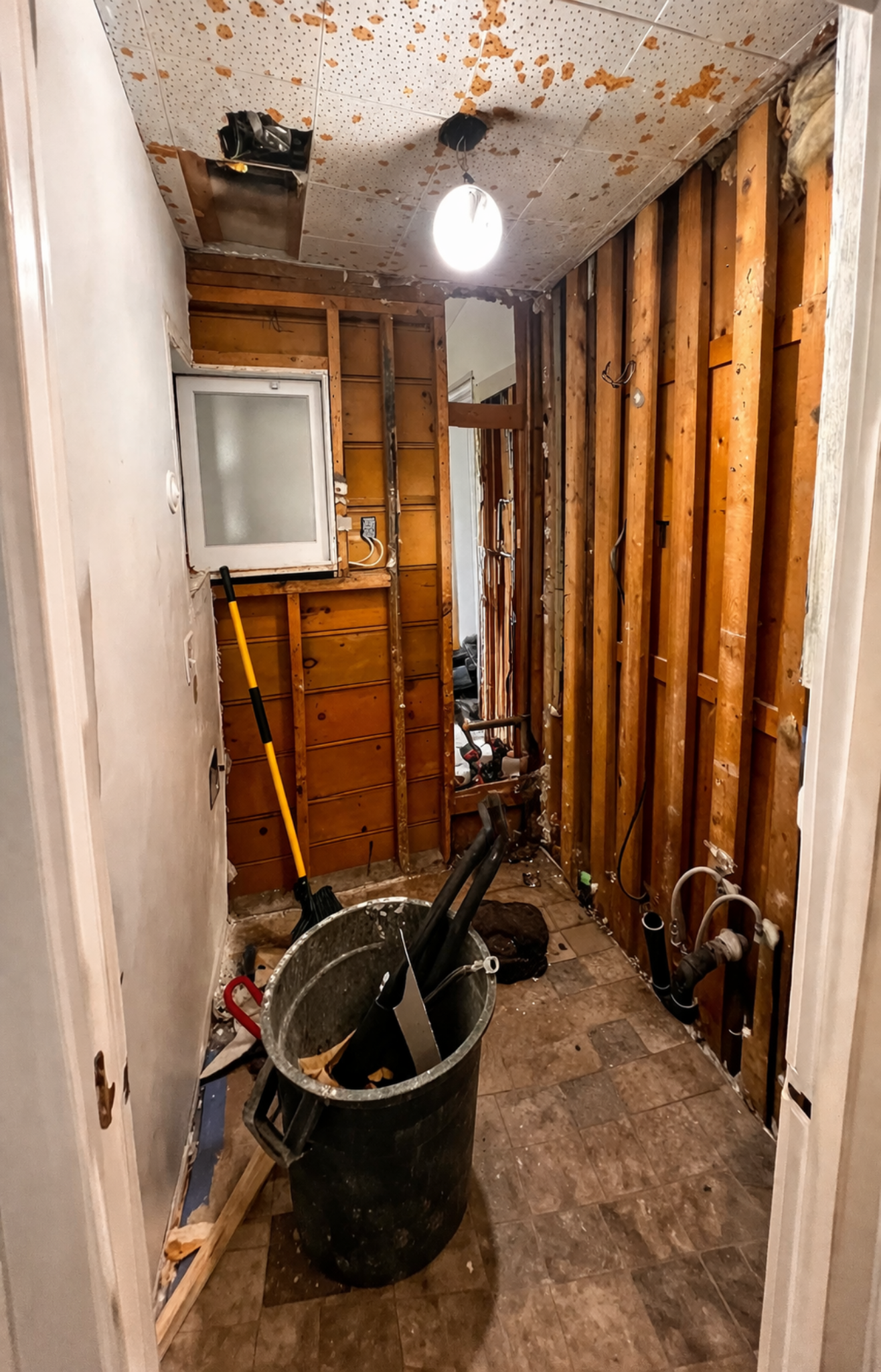 Bathroom before renovation during demolition